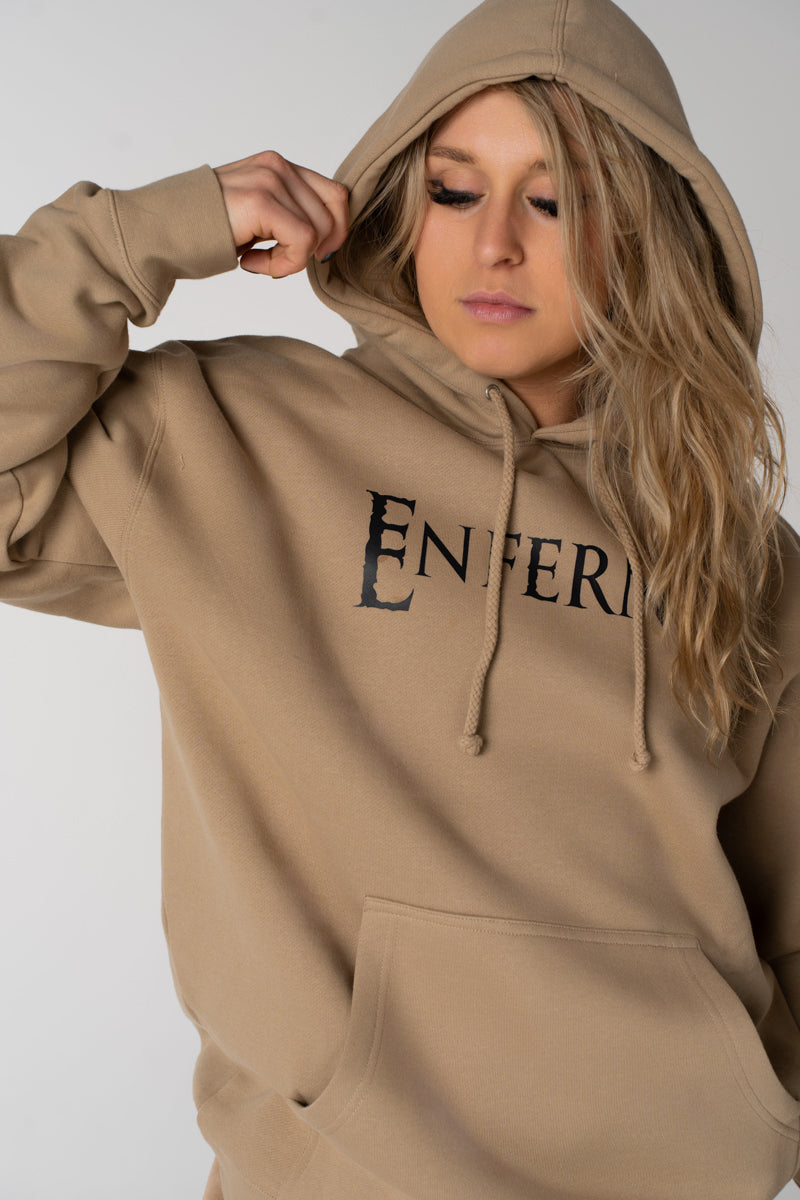 Model wearing Enferno Classic Logo Heavyweight Hoodie in Sandstone.