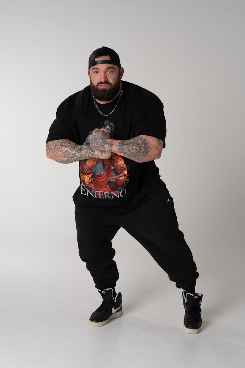 Model wearing Enferno the Crimson Catalyst Tee in Black