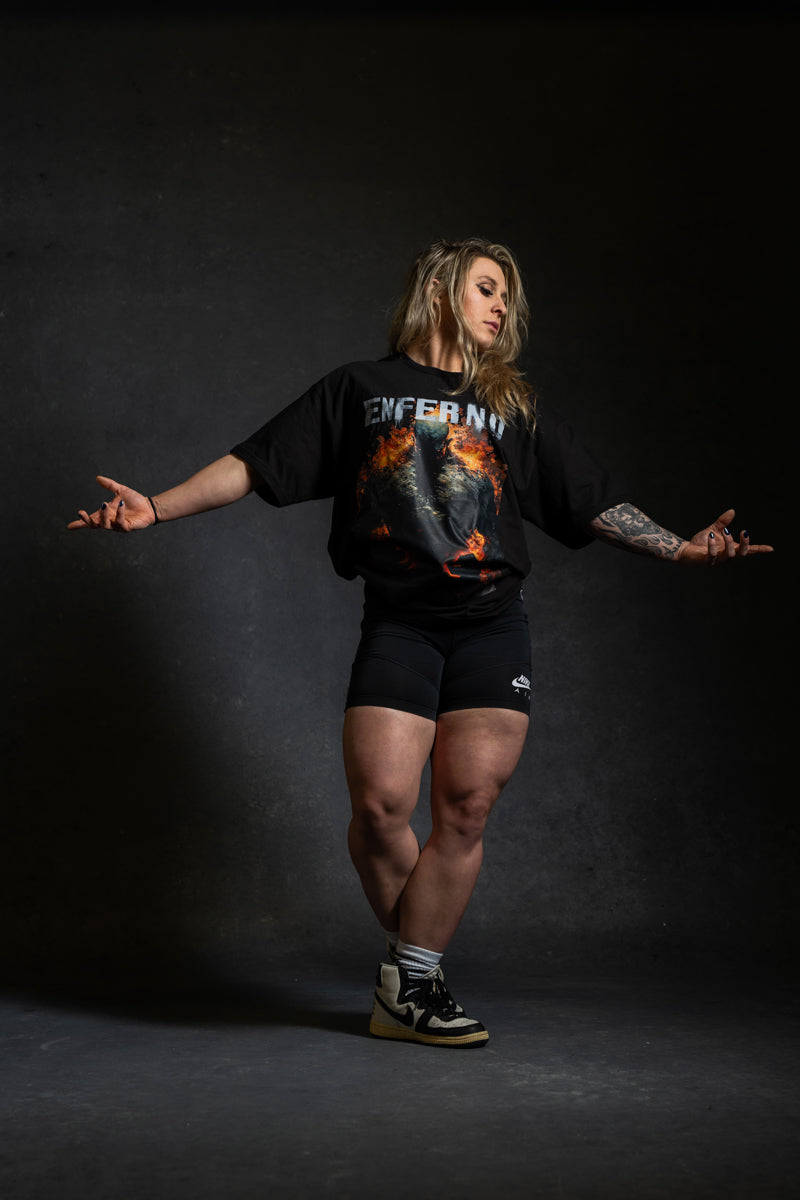 Model wearing Enferno the Fire Within Tee in Black.