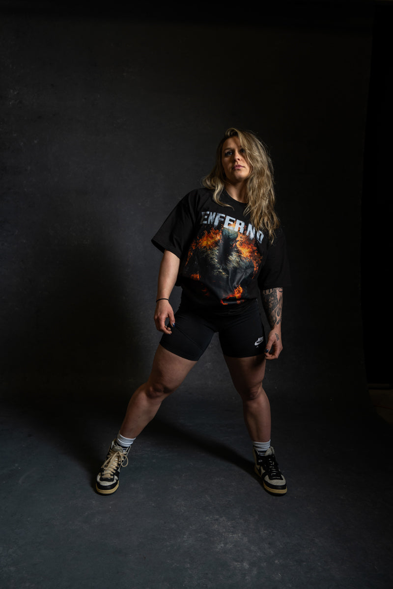 Model wearing Enferno the Fire Within Tee in Black.