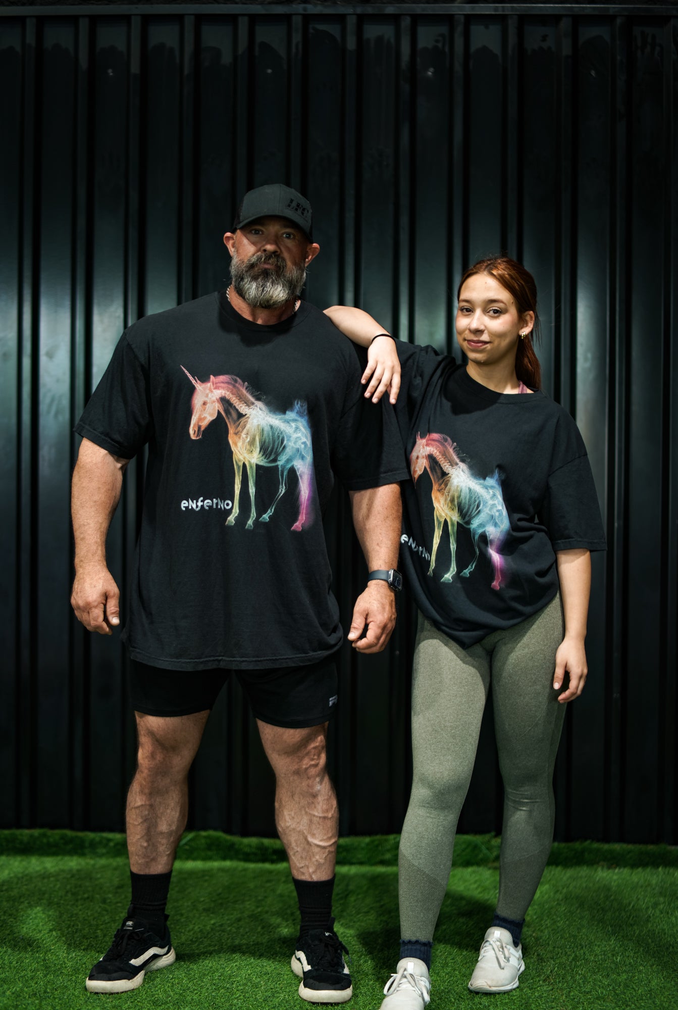 Enferno X-Ray Unicorn Tee in Black on models Grady & Madelyn.