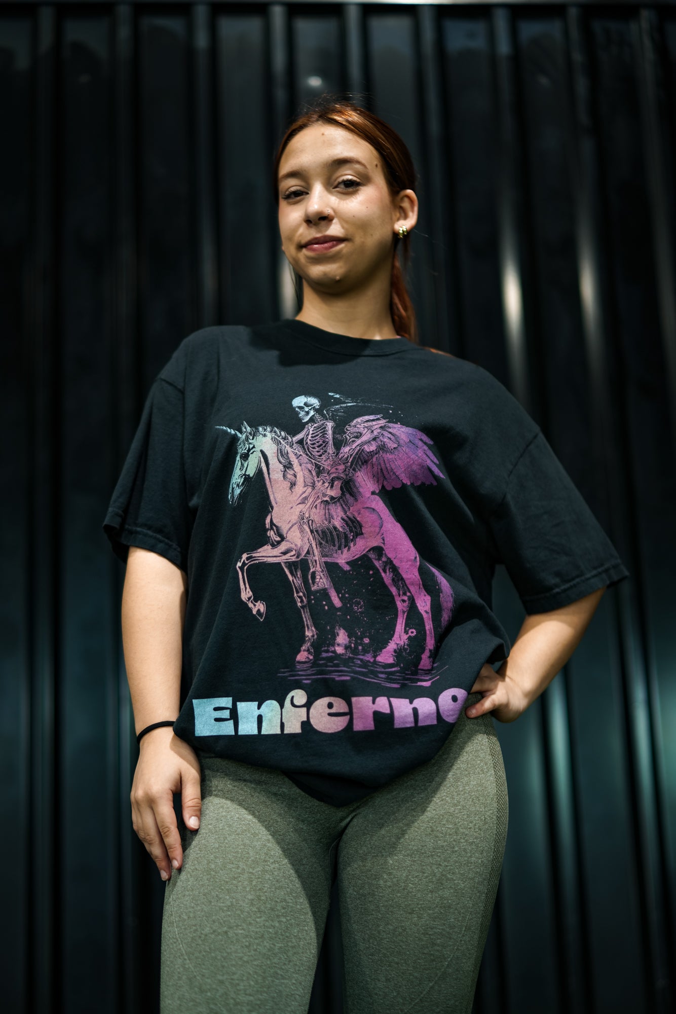 Enferno Death on a Rainbow Tee in Black on model Madelyn.