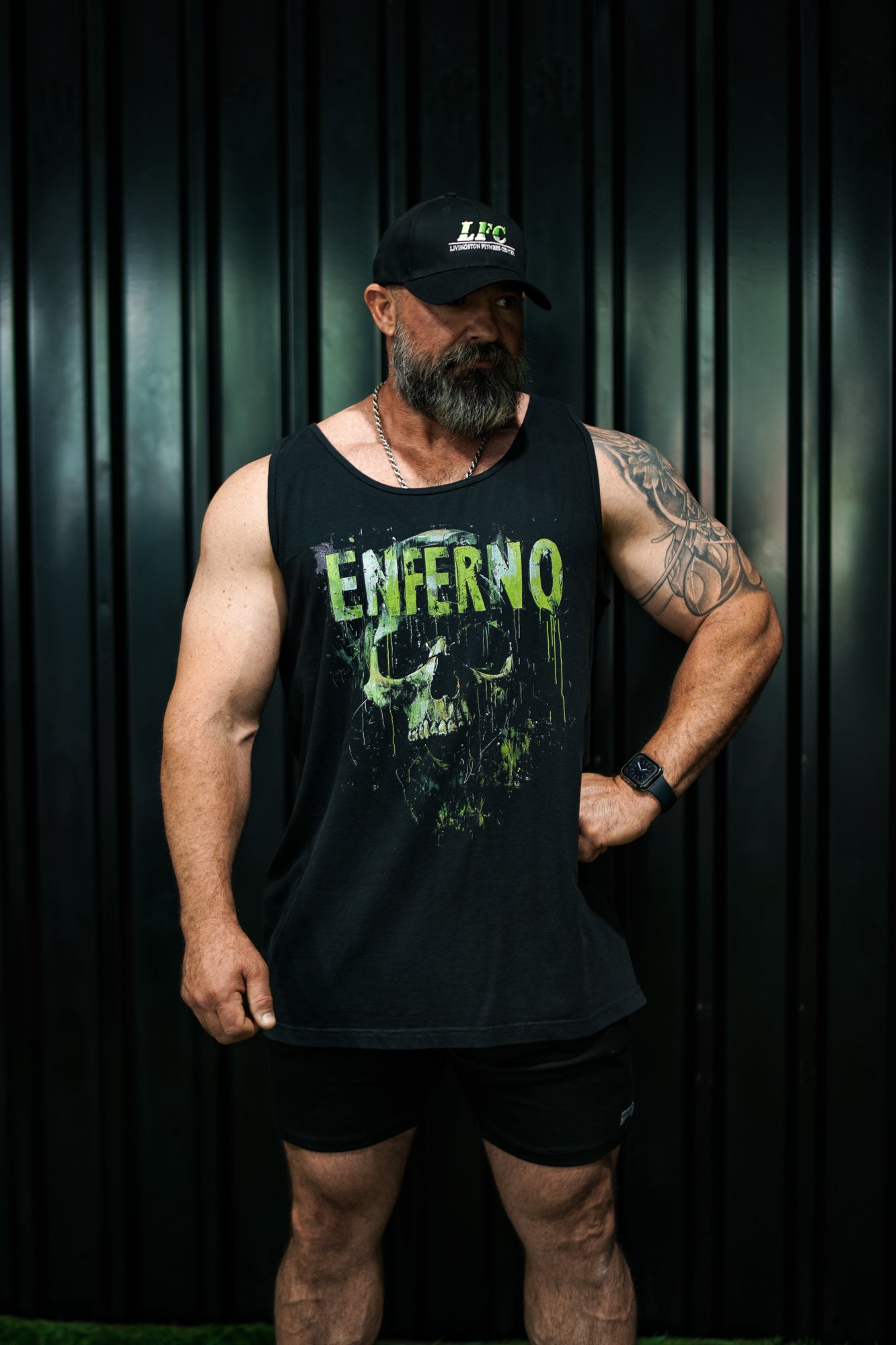 Enferno Emerald Skull Tank in Black on model Grady. 