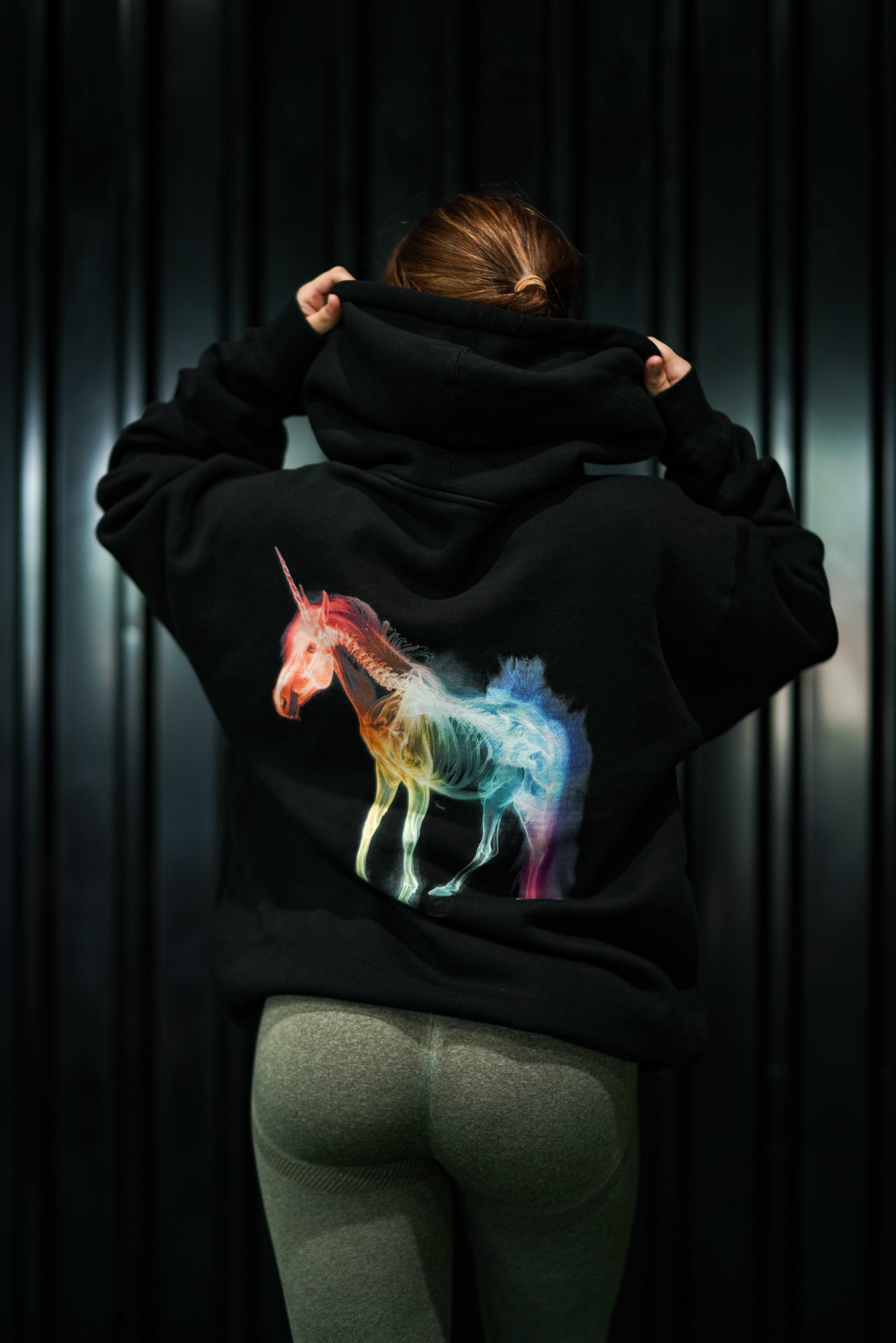 Enferno X-Ray Unicorn Hoodie in Black on model Madelyn.