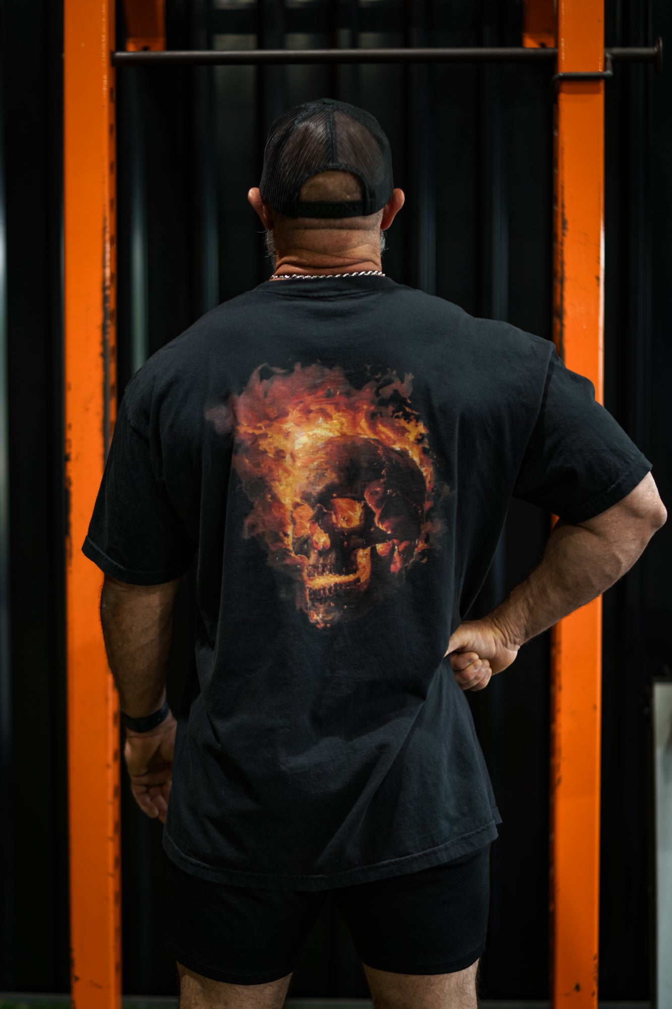 Enferno Burning Skull Tee in Black on model Grady.