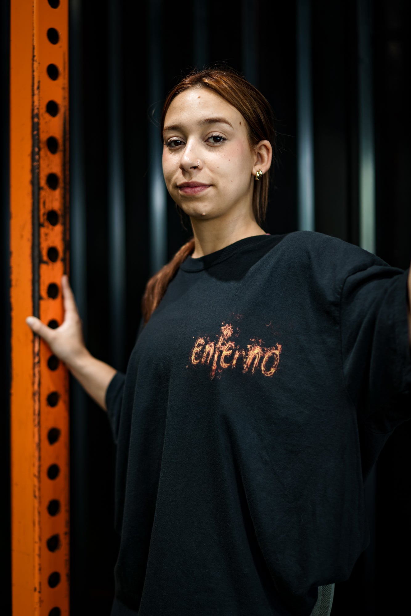 Enferno Burning Skull Tee in Black on model Madelyn.